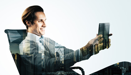 Aufkleber - Businessman using a tablet with a cityscape overlay in the background.