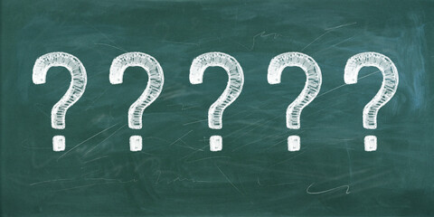 Poster - Row of question marks drawn with chalk on a blackboard.
