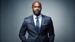 © Caitlin - Portrayal of a confident black businessman in a professional suit standing alone in a neutral transparent background with no distractions whatsoever.