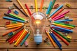 © Mahmudul - Light bulb on many colorful pencils