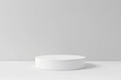 © Popelniushka - Single Platform. White Cylinder Podium for Product Presentation on Isolated White Background