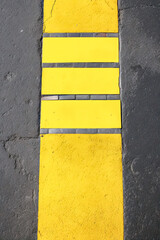 roadmark yellow line on asphalt top view