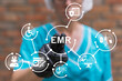 © wladimir1804 - Nurse using virtual touch screen presses text: EMR. Electronic medical or health record ( EMR or EHR ). Medicine, insurance, digital healthcare and medical document management online system concept.