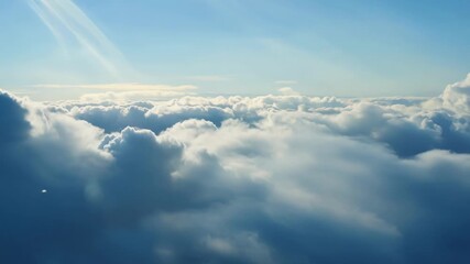 Canvas Print - A breathtaking view of highaltitude clouds seemingly endless in their expanse and height stretching as far as the eye can see.