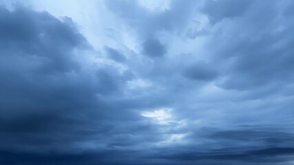 Wall Mural - a gradual transition from clear skies to a dark stormy atmosphere as the clouds multiply.