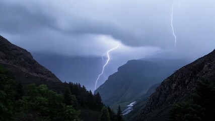 Wall Mural - dramatic footage of a storm raging through a mountain pass with heavy rain and lightning striking th