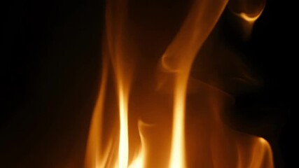 Wall Mural - ribbons of smoke twirling and twisting weaving a mesmerizing pattern above the glowing fire.