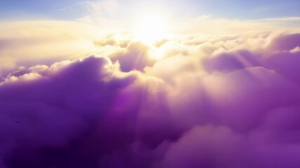 Wall Mural - a mesmerizing flight through a sea of everchanging clouds as the suns rays constantly alter their co