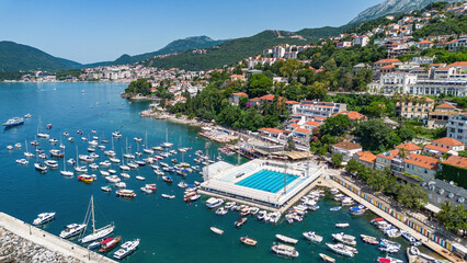 Wall Mural - Aerial view of Jadran, a swimming pool in the marina of Herceg Novi, a town in located at the western entrance to the Bay of Kotor on the coast of the Adriatic Sea in Montenegro