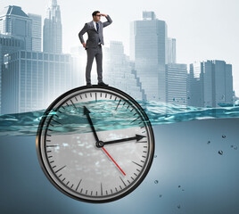 Wall Mural - Businessman in deadline and time management concept