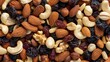 © Galib - Close-up of a mixture of almonds, cashews, raisins and walnuts.
