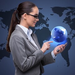 Poster - Businesswoman with phone in global business concept