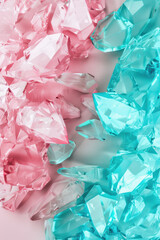 Vibrant and colorful abstract image featuring pink and blue crystal formations on a gradient background. Perfect for creative and design projects.