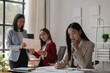 © PHOTO4U - three businessperson are working in the modern office, group of employee has discussion about new project, working as teamwork is more effective, coworkers are brainstorming to planing great strategy