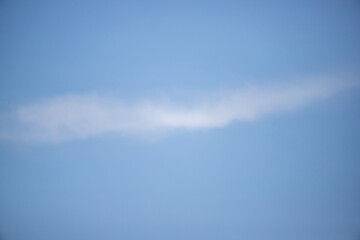 Wall Mural - Sky background with clouds. White clouds against a blue sky.