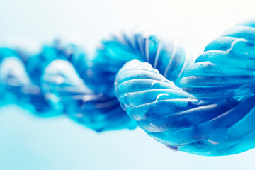 Poster - Close-up image of a blue double helix DNA structure on a light blue background, illustrating the concept of biotechnology. Generative AI