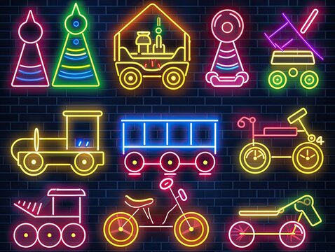 A set of toys made in neon pink in the form of silhouettes depicting various objects.