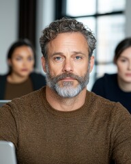 Sticker - Mature man with curly gray hair and beard in casual sweater