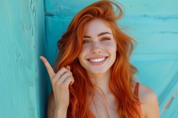 Surprised excited attractive young ginger woman wearing casual clothes and smiling pointing finger at turquoise copy space turning attention on something new looking at camera isolated, Generative AI