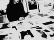 © Kevin - Korean female director of a clothing brand working on a moodboard, black and white.