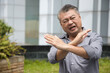 © 9nong - Frustrated angry upset displeased middle aged old asian man rejecting with X crossed arms gesture, saying no, no-no, no way with expression of hand and body gesture
