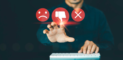 hand of client show a feedback, thumb down, service rating, negative review, dislike icon, reputatio