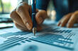 © Gonzalo - Business Professional Analyzing Growth Data on Graphs and Charts for Improvement
