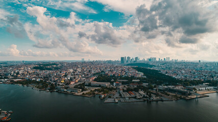 Panoramic aerial drone view of the buildings and living spaces on the peninsula on a cloudy day in Istanbul, Turkey.