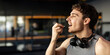 © Home-stock - Sportive man taking supplement capsule, eating omega 3 or amino acid multivitamin pill, gym interior