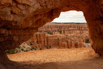 Poster - Dizzying Layers of Hoodoos Through Tunnel over Trail