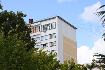 Poster - A city hall building with a clock tower, suitable for urban or municipal use.