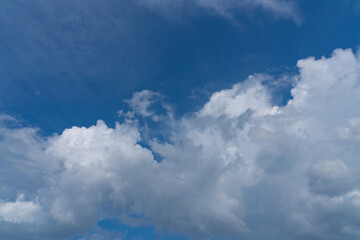 Wall Mural - white fluffy clouds isolated on a black background