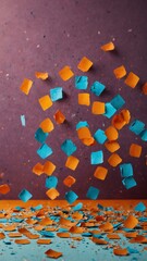 Wall Mural - orange confetti on plain colorful pastel background abstract ad concept copy space