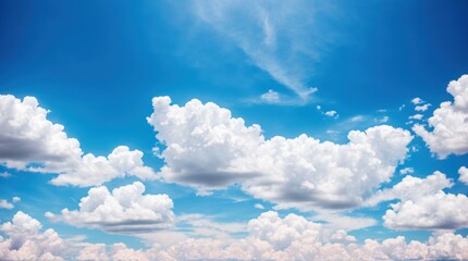 Wall Mural - Fluffy white clouds in the bright blue sky on a sunny day 