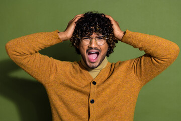 Sticker - Photo portrait of attractive young man touch head scream scared dressed stylish brown clothes isolated on khaki color background