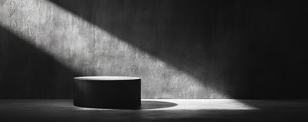Poster - Round black podium with dramatic lighting in a dark concrete room, minimalistic design concept
