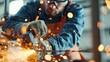© Natpasit - A skilled industrial worker in protective gear grinds metal in a factory, with bright sparks flying, showcasing precision and hard work..