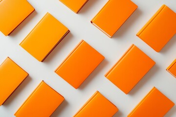 Poster - Bright Orange Notebooks Pattern on Soft White Background | Consistent Spacing and Depth | Crisp, Sunny Day Mood | Simple, Clean Composition | Repetition and Color Contrast