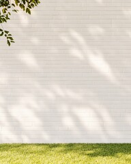 Poster - Wide-Angle View of Bright White Brick Wall with Tree Shadows on Sunny Day, Grassy Ground, Tranquil Outdoor Setting