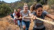 © sambath - An outdoor team-building activity involving a diverse group of people