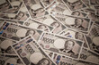 © shibadog - 日本の新一万円札。大量の一万円札が敷き詰められている。ネガティブなイメージ。