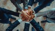 © PICK YOUR POV - Top View of Business people Stacking Hands Showing Unity and Teamwork.