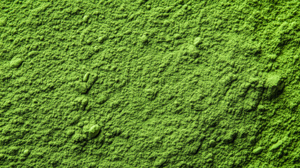 Wide angle of a vibrant green matcha powder texture background 