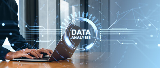 Poster - Hands typing on laptop with a digital data analysis concept overlay.