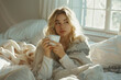 © Alexa Mat - Closeup image of a beautiful young woman holding a cup of tea to drink
