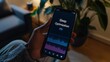 © TensorSpark - A smartphone screen displaying 'Sleep Optimization' in a cozy room, suggesting a focus on improving sleep quality using technology.