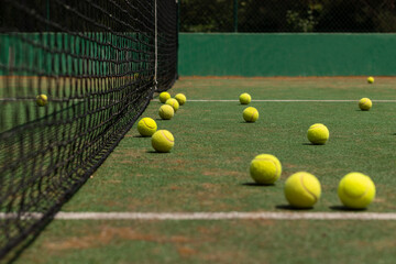 Tennis balls on tennis court