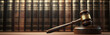 © Chrixxi - wooden gavel on top of book shelf, behind it is an entire wall with law books. Judge and judgement concept banner