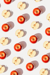 Wall Mural - Creative pattern made of apple fruits on white background with shadow. Healthy food and vitamin concept. Minimal style. Top view. Flat lay