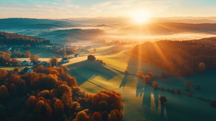 Wall Mural - Scenic sunrise over rolling hills and misty forest